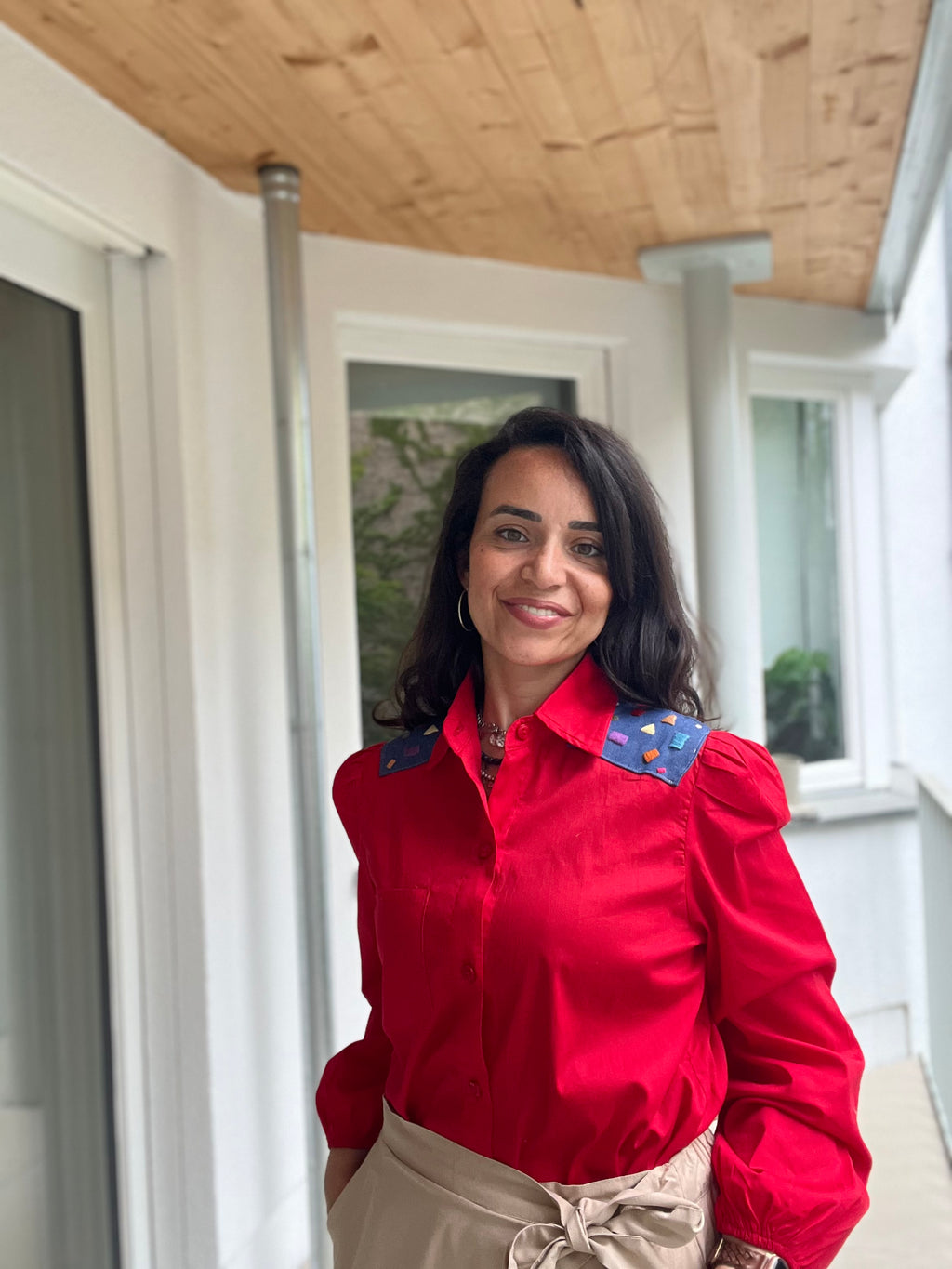 Red blouse with design denim